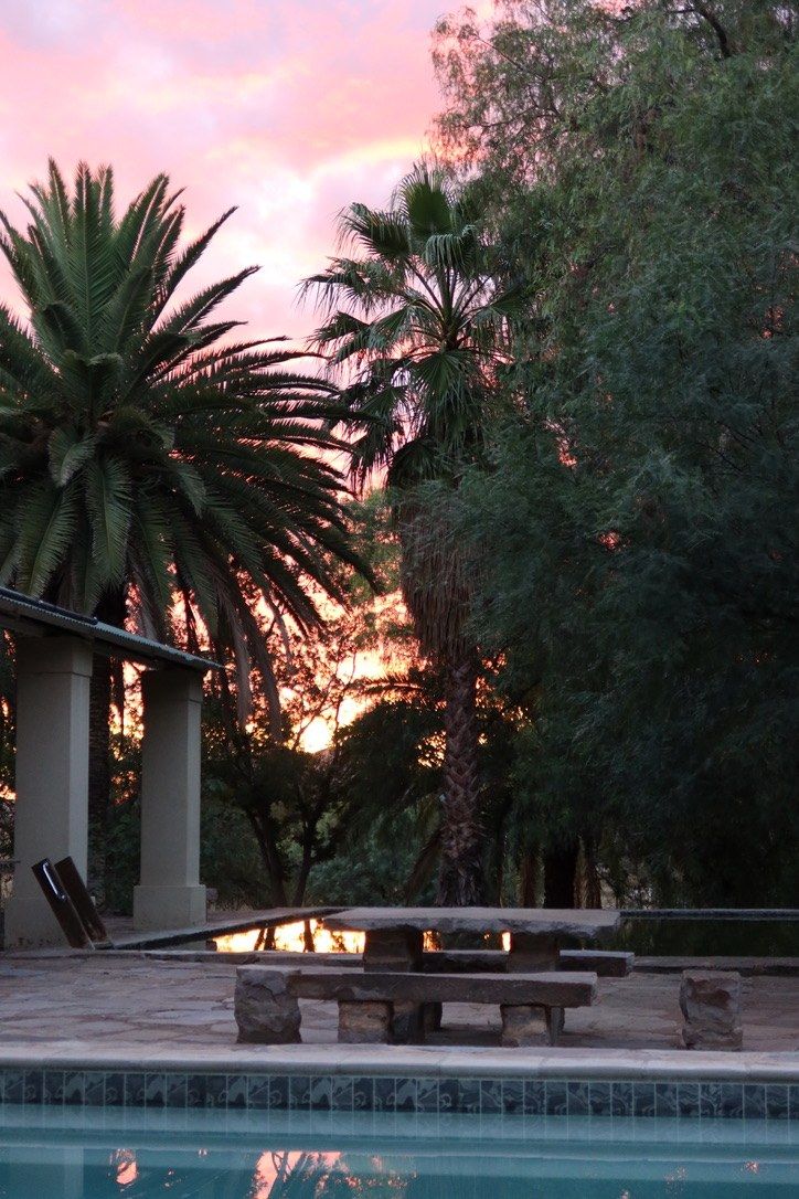 The pool terrace at dusk